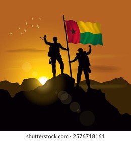 Guinea Bissau flag, silhouette of two climbers holding flags at sunset