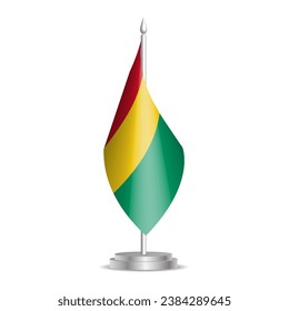 Guinea flag - 3D mini flag hanging on desktop flagpole. Usable for summit or conference presentaiton. Vector illustration with shading.