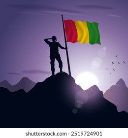 Guinea-Fahne auf einem Berggipfel gehisst mit einem violetten Sonnenuntergang im Hintergrund, Vektorgrafik
