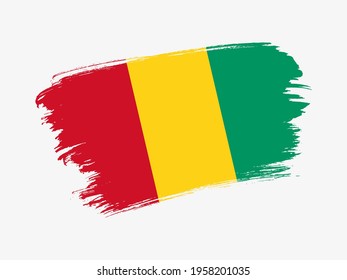 Guinea flag made in textured brush stroke. Patriotic country flag on white background