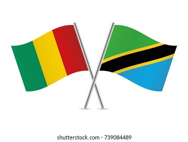 Guinea and Tanzania crossed flags. Guinean and Tanzanian flags on white background. Vector icon set. Vector illustration.