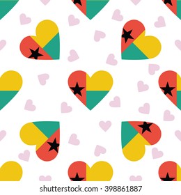 Guinea-Bissau flag independence day seamless pattern. Patriotic country flag background. Guinea-Bissau flag in the shape of heart. Vector seamless pattern.