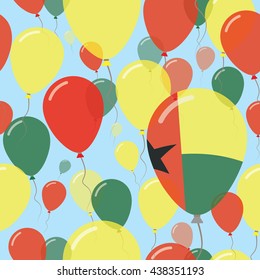 Guinea-Bissau National Day Flat Seamless Pattern. Flying Celebration Balloons in Colors of Guinea-Bissauan Flag. Guinea-Bissau Patriotic Background with Celebration Balloons.