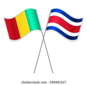 Guinean and Costa Rican crossed flags. Guinea combined with Costa Rica isolated on white. Language learning, international business or travel concept.