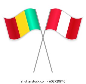 Guinean and Peruvian crossed flags. Guinea combined with Peru isolated on white. Language learning, international business or travel concept.
