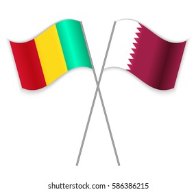 Guinean and Qatari crossed flags. Guinea combined with Qatar isolated on white. Language learning, international business or travel concept.