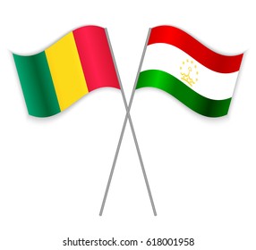 Guinean and Tajikistani crossed flags. Guinea combined with Tajikistan isolated on white. Language learning, international business or travel concept.