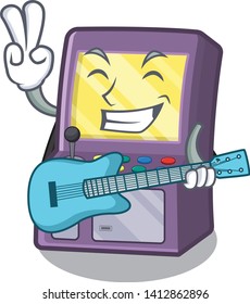 With guitar arcade machine next to mascot table