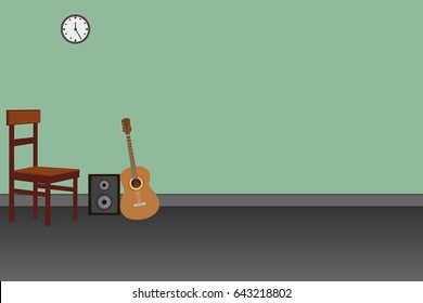 A guitar with chair and speaker in living room.
