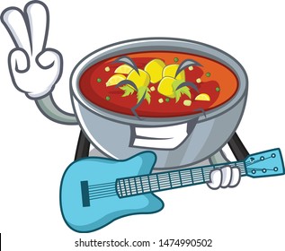 With guitar gazpacho dishes above wooden table character