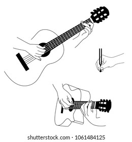 Guitar and hands isolated on white background.