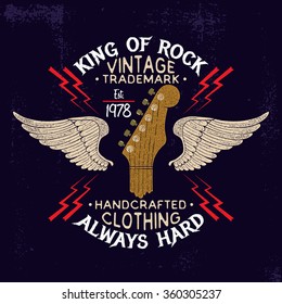 Guitar head and wings rock music emblem. Vintage typography design for t-shirts,apparel,prints.