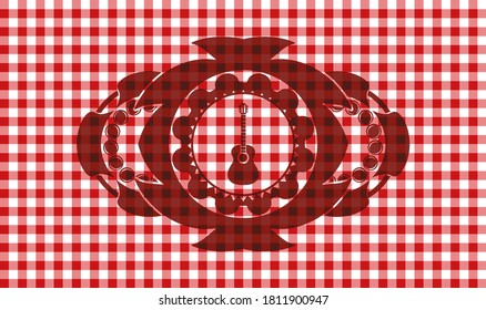 guitar icon inside red checkered tablecloth realistic emblem. Restaurant handsome background. Illustration. 