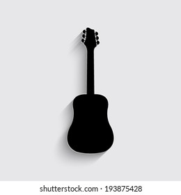 Guitar icon with shadow on a grey background