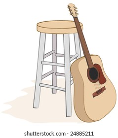 guitar leaning against stool