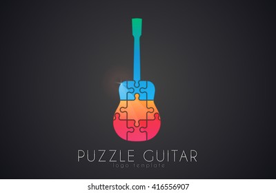 Guitar logo. Puzzle guitar logo design. Creative guitar logo. Music logo.