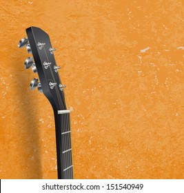 guitar neck on grunge background