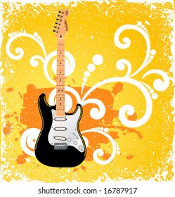 Guitar on yellow vintage background