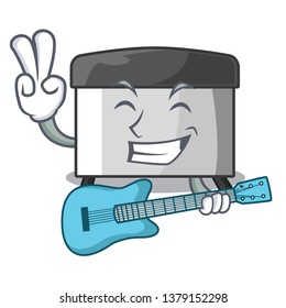 With guitar pastry scraper on wooden mascot table
