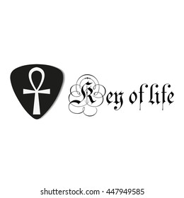 guitar pick with ankh sign and lettering "key of life"