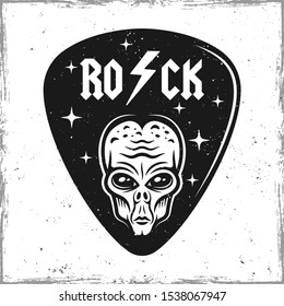 Guitar pick or mediator with alien head vector design template isolated on background with removable textures