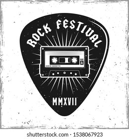 Guitar pick or mediator with audiotape and text rock festival. Vector design template isolated on background with removable textures