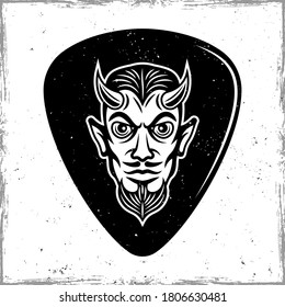 Guitar pick or mediator with horned devil head. Vector design template isolated on background with removable textures