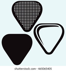 Guitar plectrum. Image isolated on blue background