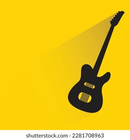 guitar with shadow on yellow background