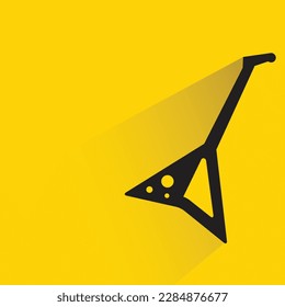 guitar with shadow on yellow background