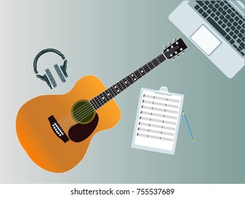 Guitar and sheet music on the table vector