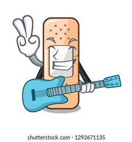 With guitar sticking plaster on the mascot table
