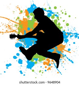 Guitarist jumping in the air with paint splats as a background