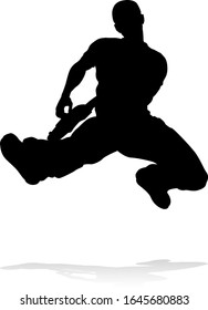 A guitarist musician in detailed silhouette playing his guitar musical instrument.