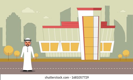 A Gulf man stands on a road in front of the buildings