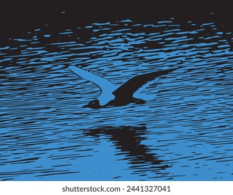 Gull skimming over water silhouette