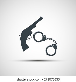 Gun and handcuffs. Vector image.