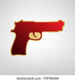 Gun sign illustration. Vector. Red icon on gold sticker at light gray background.