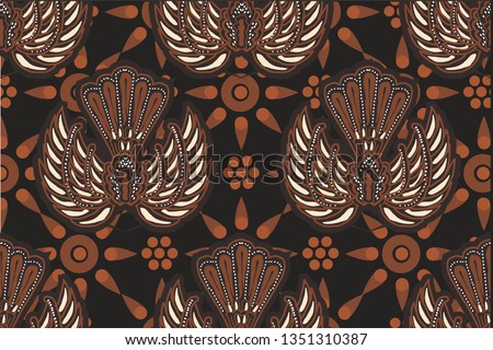    
Gurda Batik Motif. This motif consists of two wings (lar) and in the middle there is a body and tail. Gurda comes from the word Garuda, the big bird has an important position in Javanese society Zdjęcia stock © 
