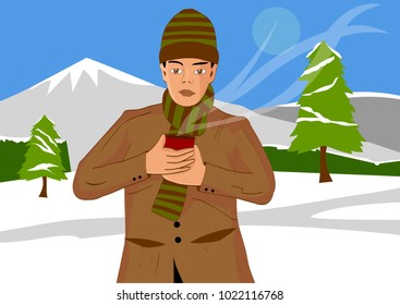 The guy drinks coffee in the mountains in winter