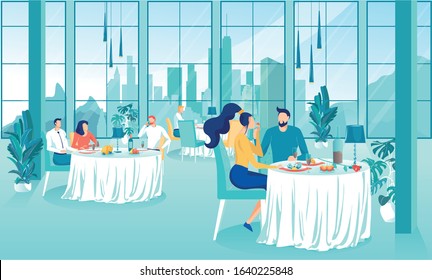 Guy Feeds Cute Girl on Date in Popular Restaurant. Cute Couple Spend Time Together. On Table they have Beautifully Laid out Food. Hall has Big Windows that make Room Visually Larger and More Spacious.