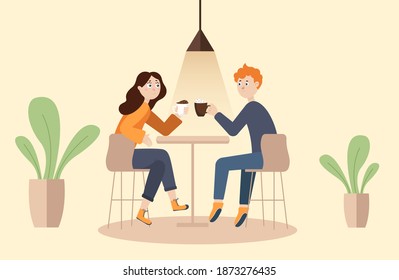 a guy with a girl with a cup of coffee sitting in a cafe