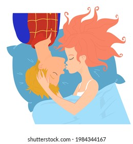 The guy and the girl are kissing lying on the pillow. The guy is wearing pajamas that resemble a superhero costume. He is upside down in relation to the girl.