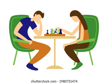 A guy and a girl are playing a game of chess