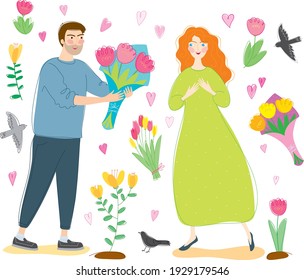 The guy gives flowers. A woman loves a man. Spring and flowers. Red hair. Blue sweater and green dress. People love 