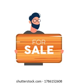A guy with glasses holds a wooden sign with the inscription For Sale. A young male holds a wooden sign isolated on a white background. Vector.