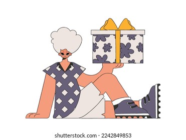 The guy is holding a gift box in his hands. Holiday gift theme.
