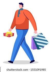 Guy holding red box and colorful bags in hands. Guy ready to give gifts and greet with holiday. Packages with presents inside and tied by ribbon. Person in sweater and pants. Vector illustration