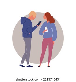 Guy in hoodie and girl in oversized sweater hold their smartphones in their hands and discuss news from the Internet. Vector flat illustration on a round isolated background