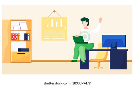 A guy with a laptop sits on the table, works and raises his hand up to answer. Businessman in the office during the working day. Office employee at workplace. Online communication on the Internet